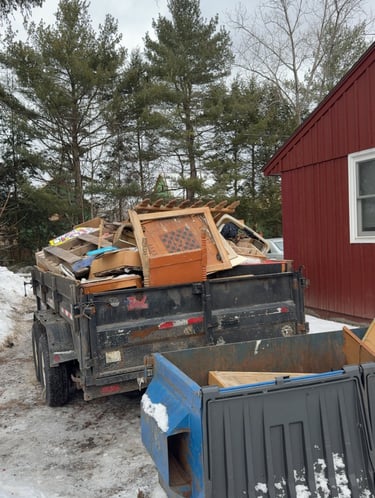 Removing large appliance from basement during junk removal job
