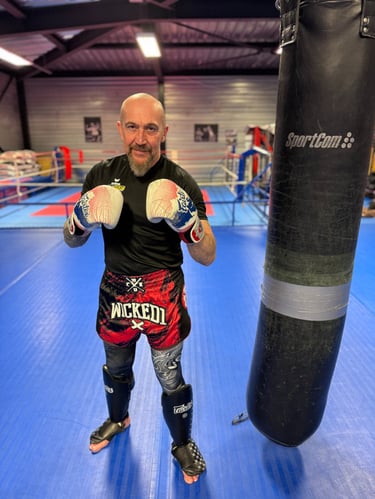 Portrait du coach et président du club de boxe