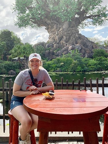 Kasey Kalk pictured with her husband in front of the Tree of Life at Disney's Animal Kingdom®.
