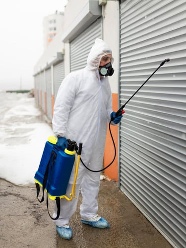 a man in a white suit and a blue backpack
