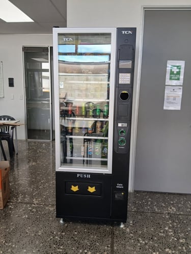 Cashless snack and drink vending machine installed at an accommodation and hospitality site.