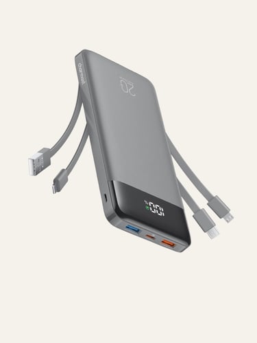 Slim grey Charmast portable power bank with built-in charging cables and digital LED battery display.