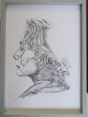 Side of Aung San Suu Kyi's face drawn by black ink pen