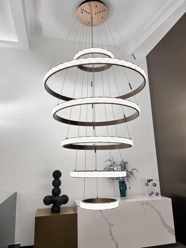 a large circular light fixture with a circular light fixture