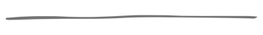 A single, minimalist gray hand-drawn line divider on a solid black background.