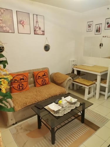 a living room with a couch and a table