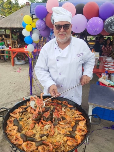 Austrian Chef serving his Paella during a party