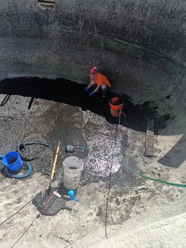 Hand Digging to Remove Mud