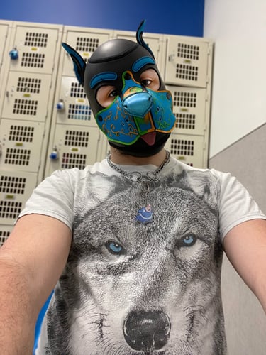 Man in pup mask.