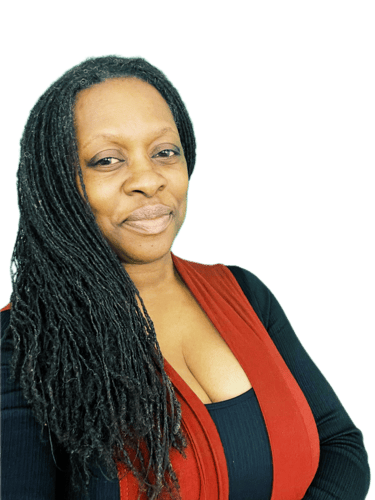 A Doula with long hair and a red vest, smiling warmly