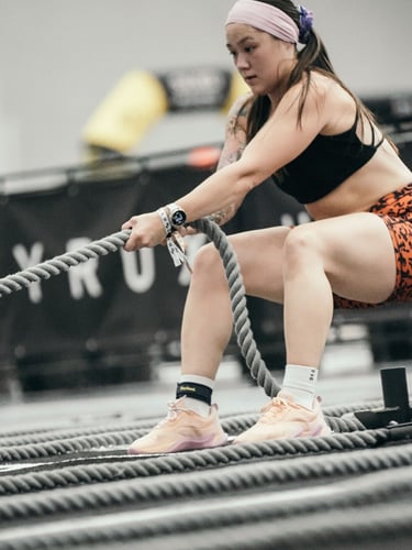 an athlete pulling a rope