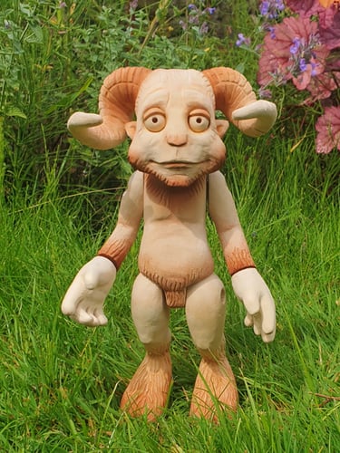 Original character sculpture produced using wood carving techniques