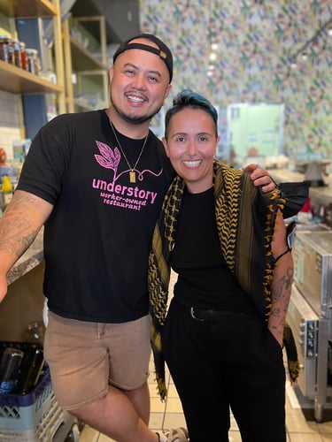 two understory collective participants standing in a kitchen
