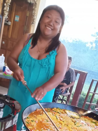 preparing Paella with a lot of passion and love