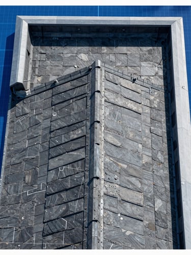 Top-down orthomosaic map of a commercial roof detailing structural scans, sharp technical resolution, high-contrast slate background, blueprint-blue grid lines