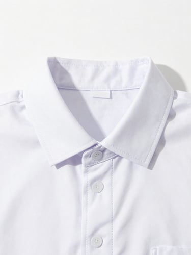 Close-up of clean, crisp uniform collars and detailed embroidery stitching under bright, high-key studio lighting, sharp focus, 35mm