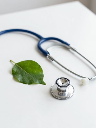 Clean white desk with a classic silver stethoscope and a fresh green leaf beside it, soft natural morning light, shallow depth of field, minimalist medical setting