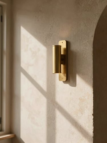 Cinematic close-up of premium restaurant construction site, warm natural window light casting dramatic shadows on raw plaster walls and custom brass fixtures, shallow depth of field, 35mm