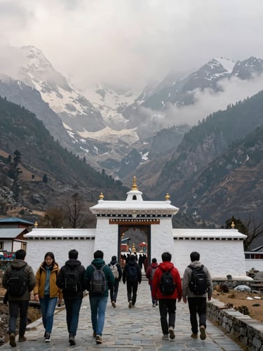 Wide environmental shot across a misty Himalayan valley in Nepal, a group of travelers on a stone pathway in the foreground walking toward a whitewashed temple gate, overcast morning light, mountains filling the background