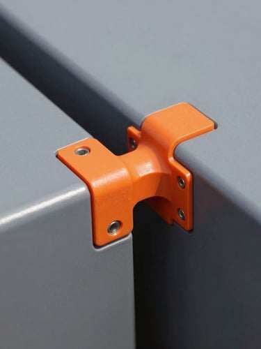Close-up macro shot of a heavy-duty interlocking joint, safety orange structural connector joining charcoal grey HDPE panels, sharp industrial details, bright natural daylight, 50mm