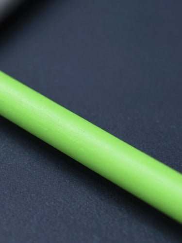 Abstract representation of digital data pipelines with high contrast neon green highlights on deep slate backgrounds, sharp corporate photography style, 35mm