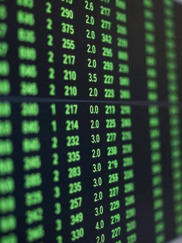Extreme close-up of a real-time programmatic bidding data stream visualization on a dark screen, glowing green nodes, portrait aspect