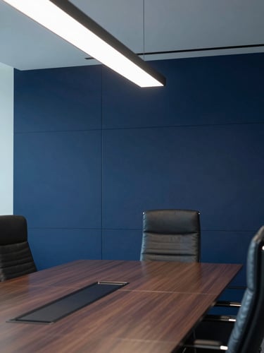 Medium shot of modern corporate boardroom in West Bay Doha, crisp architectural lighting, deep navy tones, professional mood, 35mm