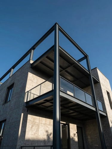 Low-angle architectural shot of a modern residential steel frame under harsh afternoon sun, sharp shadows, deep blue sky background