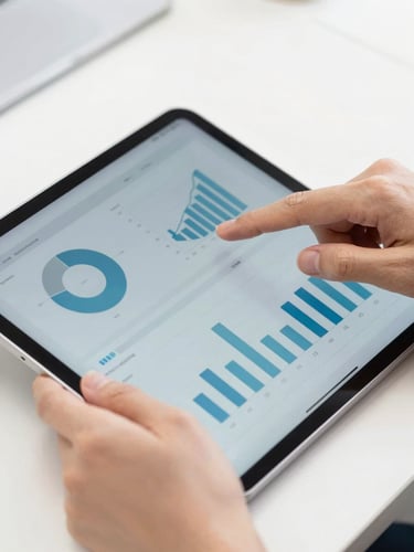 Close-up of hands interacting with a sleek tablet showing data charts, bright daylight, clean tech photography, 35mm
