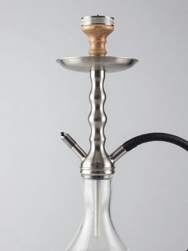 Close-up studio shot of elegant modern hookah stems and glass bases with metallic textures on a clean light gray backdrop