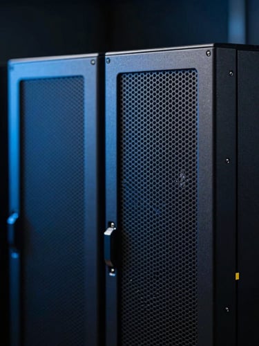 Sleek close-up of high-end server hardware in a dark room, dramatic low-key lighting, cool slate and electric blue tones, sharp focus, 35mm lens