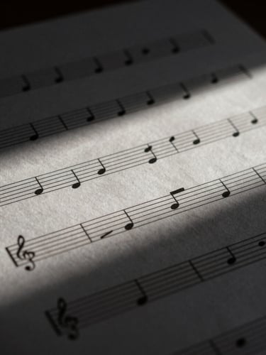 Macro shot of printed sheet music on textured heavy paper, elegant black notation, soft directional window light, deep shadows.