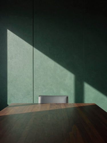 Moody architectural detail of a modern high-end boardroom, sharp diagonal shadows on dark wood, soft directional window light, 35mm.