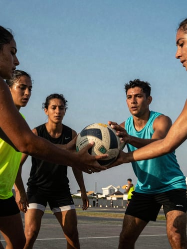 Low-angle dynamic sports photography of diverse quadball players in Lima, sweat-glistening faces, holding the game ball under dramatic late-afternoon sun, vibrant neon cyan accents.