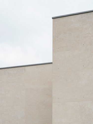 Minimalist architectural detail of the European Court of Justice building in Luxembourg, clean concrete lines, soft overcast daylight, elegant composition, 35mm lens