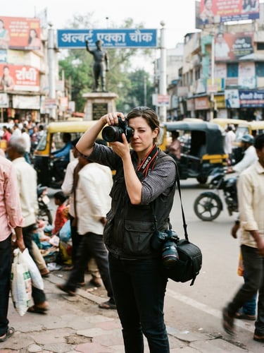 A professional photojournalist holding a camera on a busy Ranchi street, Albert Ekka Chowk visible in the soft-focus background, natural daylight, high contrast editorial style