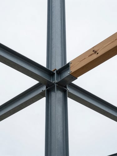 Close-up of a technical architectural drawing showing structural framing details, steel joints, crisp drafting lines, natural daylight, 35mm