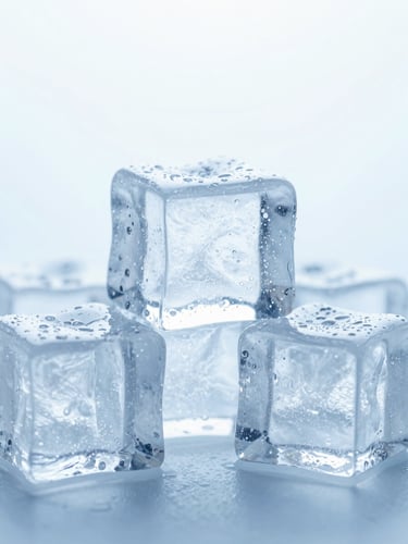 Macro shot of perfectly clear ice cubes with crisp frost texture and subtle condensation, high-key studio lighting, cool blue backlighting, 50mm
