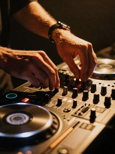 Moody close-up of hands on a premium DJ controller, warm ambient golden uplighting, deep shadows, 35mm film grain, moody event photography