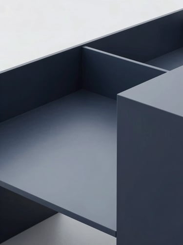 High-angle geometric composition of a clean, structured modern workspace with architectural lines, cool overcast daylight, desaturated navy tones, sharp focus, 35mm.