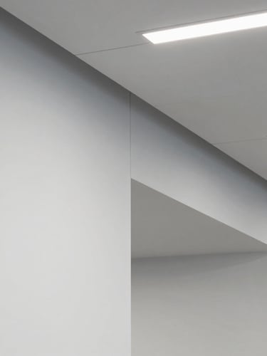 Vertical portrait of a modern office interior showing clean drywall installation and geometric ceiling panels, crisp architectural lighting, sharp details, professional finish