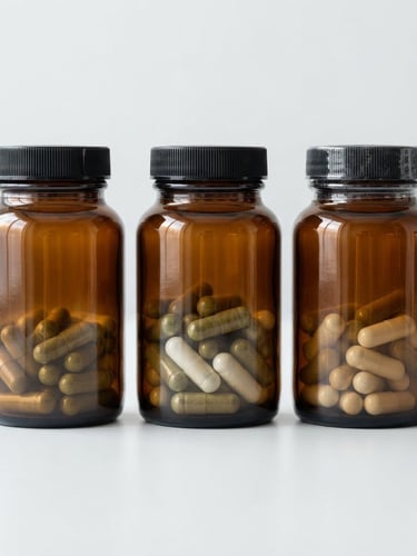 Clean, high-key studio photograph of three amber glass supplement bottles, diffused natural light, soft shadows, minimalist white background, medical white and deep forest green tones.