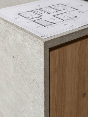 Technical architectural blueprint of the same kitchen island detailing joint connections and precise millimeter measurements, clean black lines on off-white paper