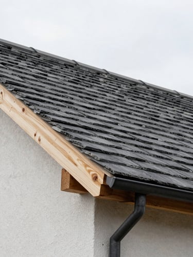 Crisp architectural detail of slate roofing tiles and timber joints on a residential building, overcast daylight, sharp focus, 35mm