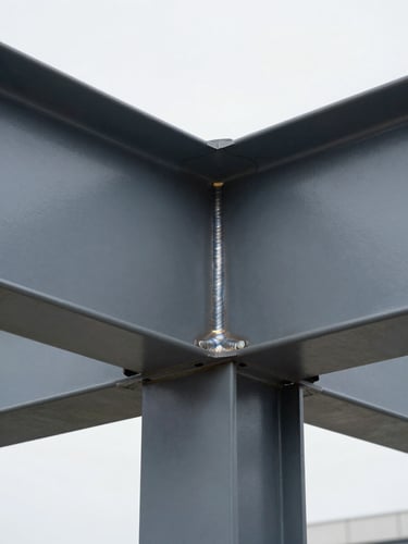 Macro photography of a perfectly smooth welded T-joint on a steel beam, freshly painted in matte dark grey, clean architectural lines, bright daylight.