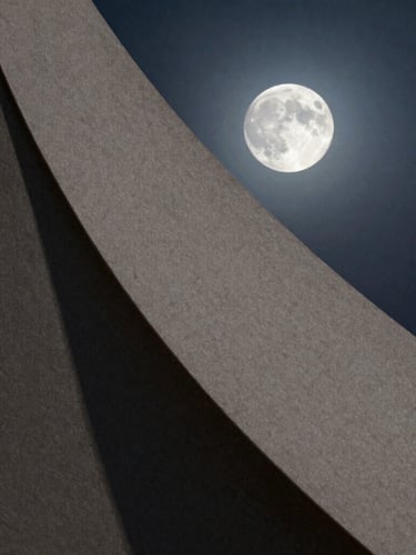 Wide cinematic composition of textured handmade paper catching single-source cool moonlight, casting deep architectural shadows to the left.