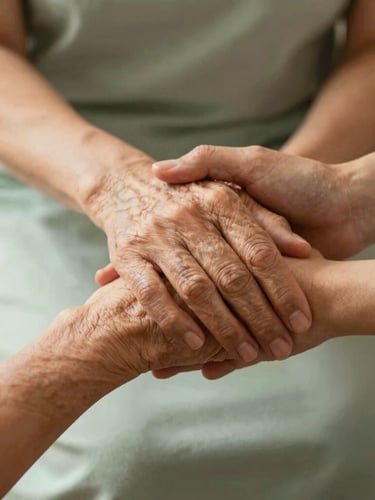 Hands of a younger caregiver gently holding the wrinkled hands of an elderly person, soft warm lighting, serene and comforting environment.