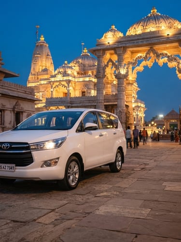 A vertical portrait of a pristine white Toyota Innova Crysta parked near the elegant arches of Prem Mandir in Vrindavan during golden hour twilight, soft warm lighting, professional travel photography