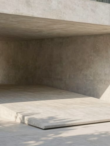 Elegant modern ramp integrated into a landscaped garden entrance, warm natural light, soft shadows, minimalist concrete architecture