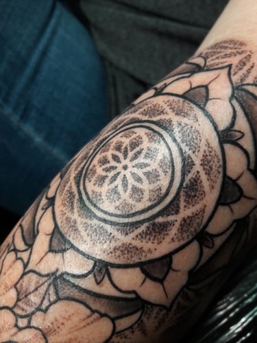 Dotwork mandala tattoo